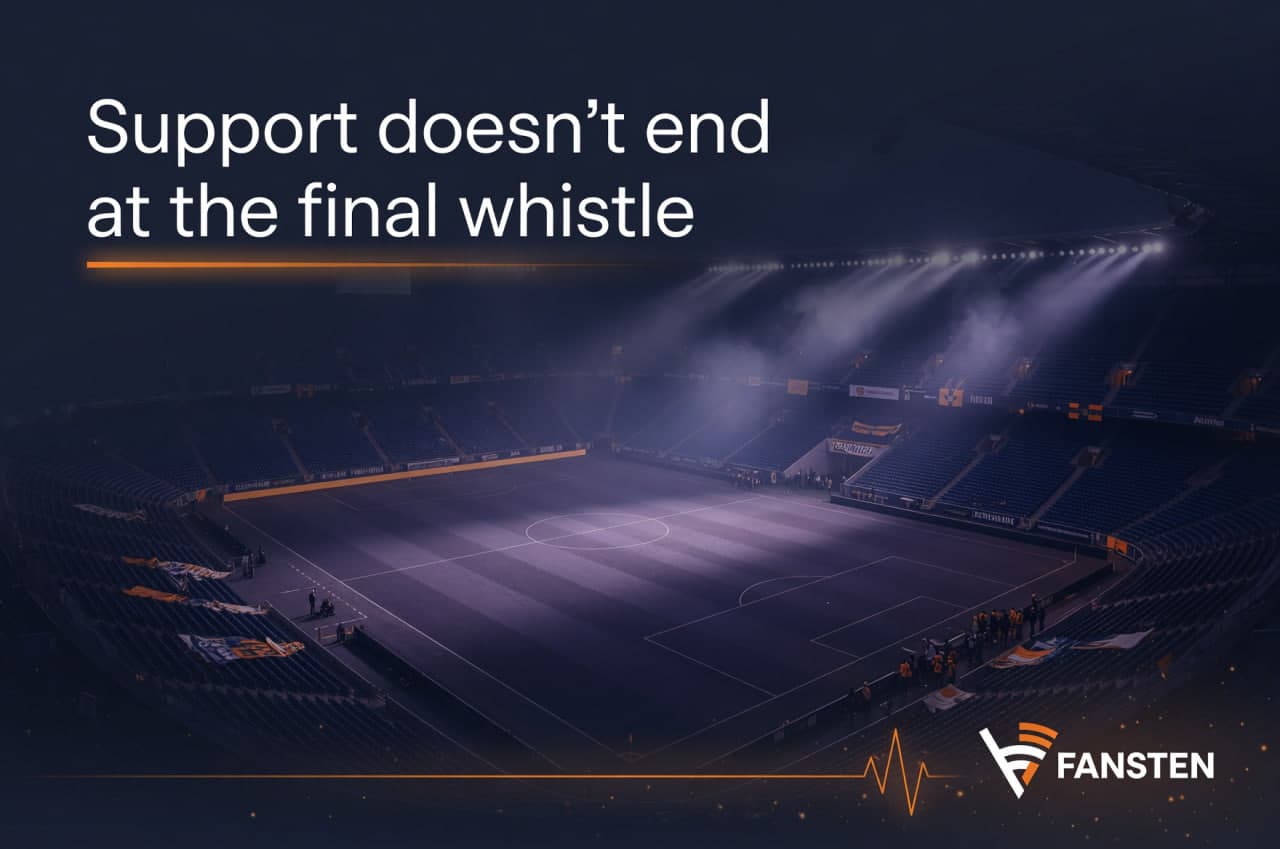 A calm post-event stadium atmosphere that suggests support continuing after the final moment.